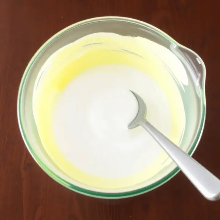 Making Butter Slime, mixing water and glue